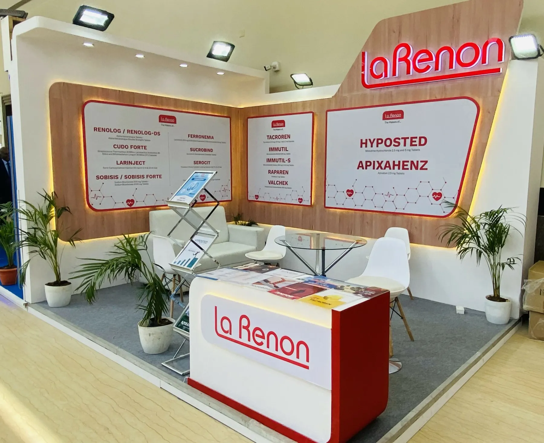 A fabricated exhibition stall with branded fascia and display counters